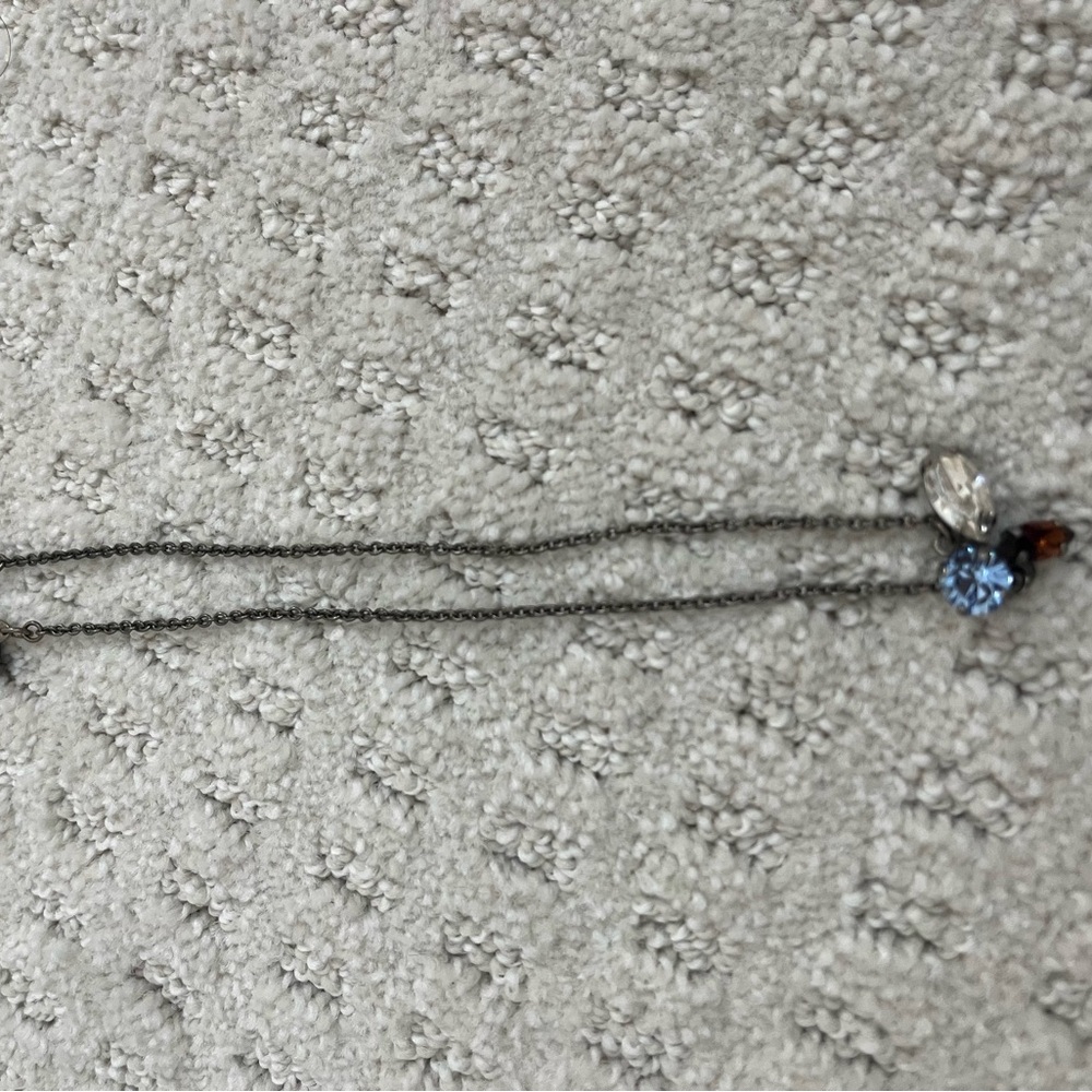 Elegant Silver Necklace with Blue and Clear Pendants